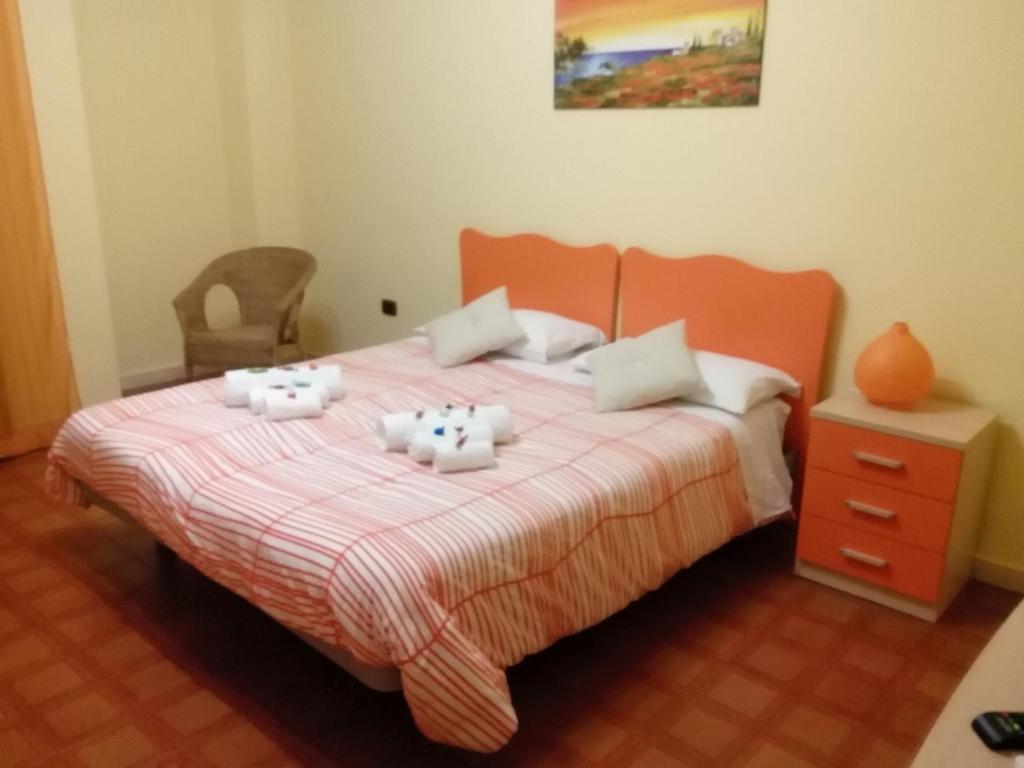Postel nebo postele na pokoji v ubytování B&B Abitazione Sandra