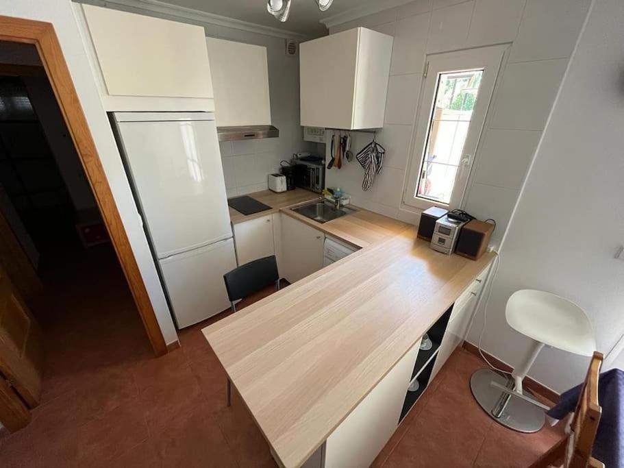 A kitchen or kitchenette at Apartamento Lagos Azules II