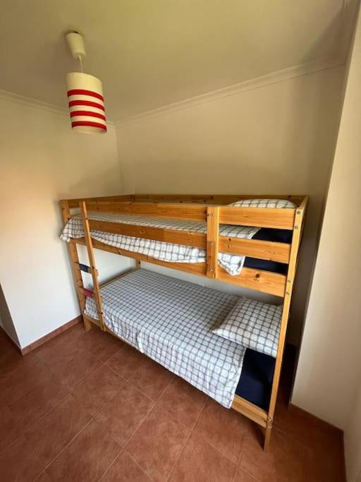 A bed or beds in a room at Apartamento Lagos Azules II