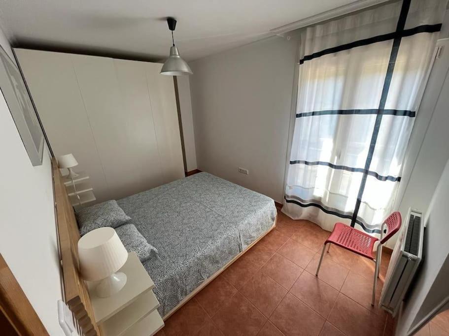 A bed or beds in a room at Apartamento Lagos Azules II