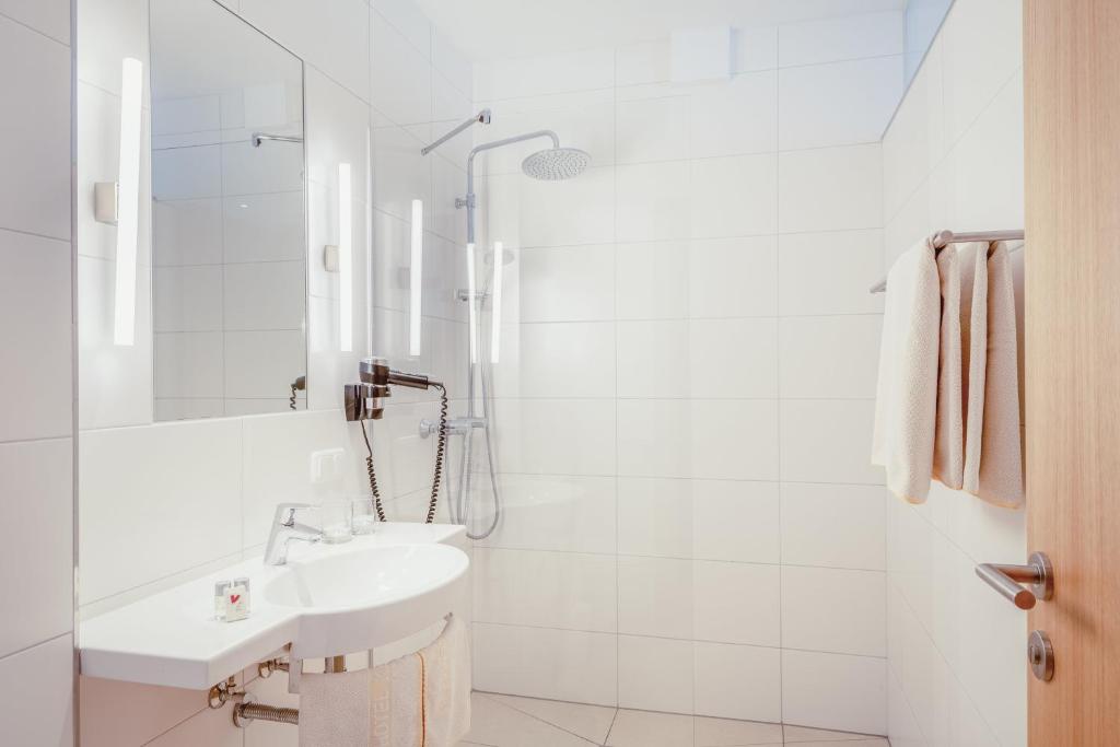 Koupelna v ubytování Hotel Kendler