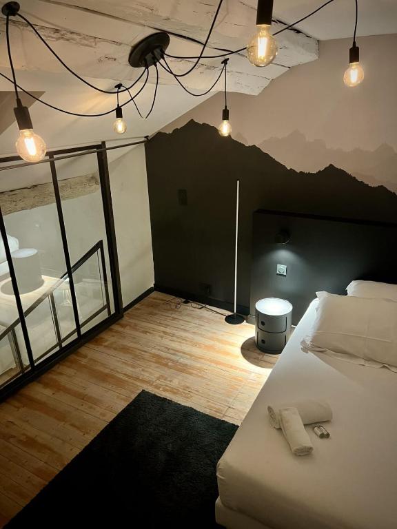 Posteľ alebo postele v izbe v ubytovaní Le Loft Carnot - Apartment in the heart of the city