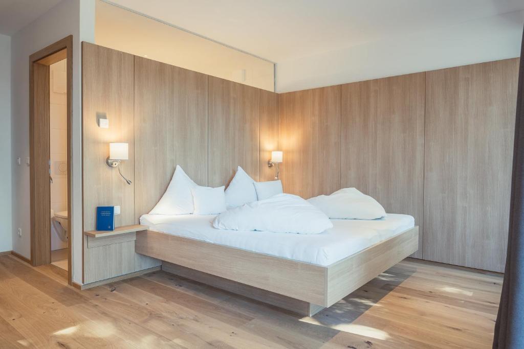 Postel nebo postele na pokoji v ubytování Hotel Kendler