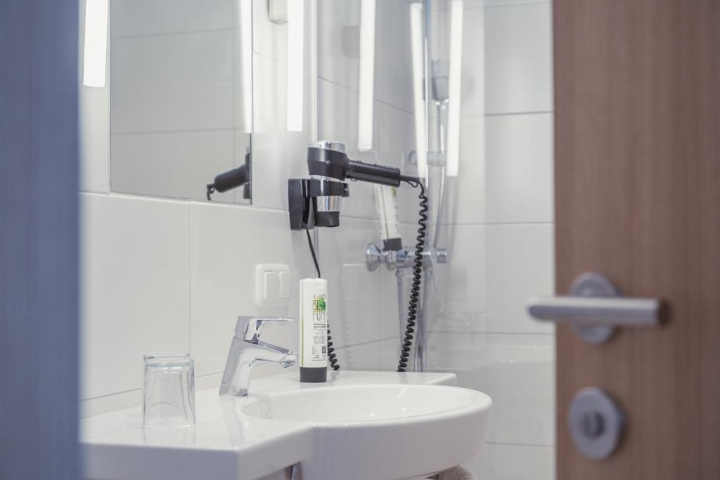 Koupelna v ubytování Hotel Kendler