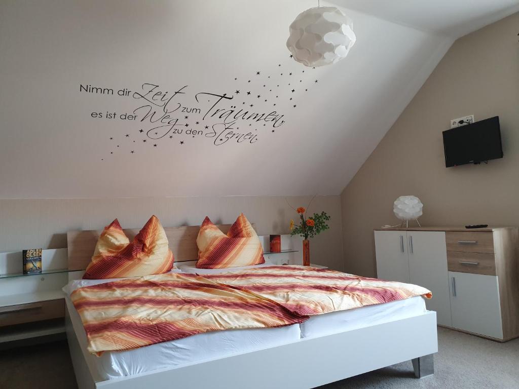 Voodi või voodid majutusasutuse Ferienwohnung Mühlenhof toas