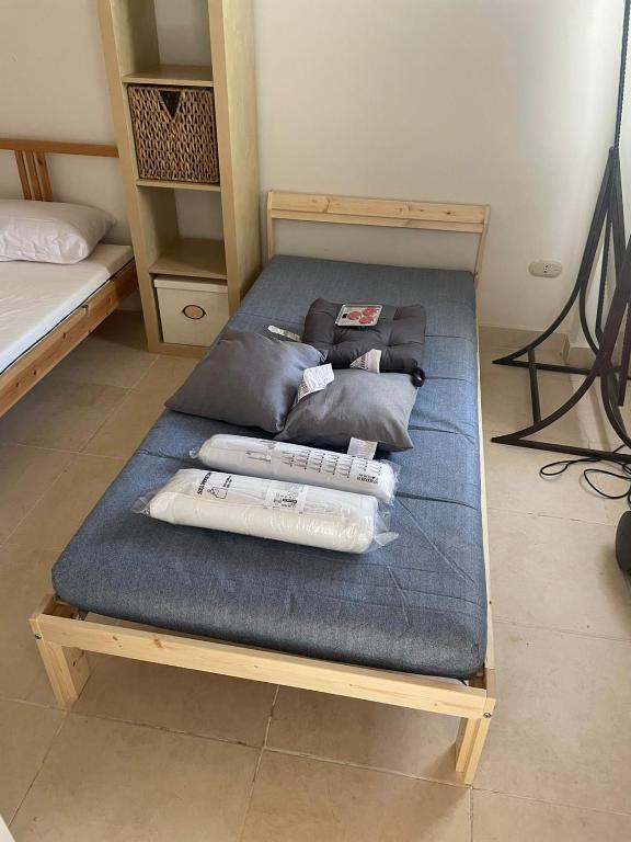 A bed or beds in a room at Makadi heights luxury complex