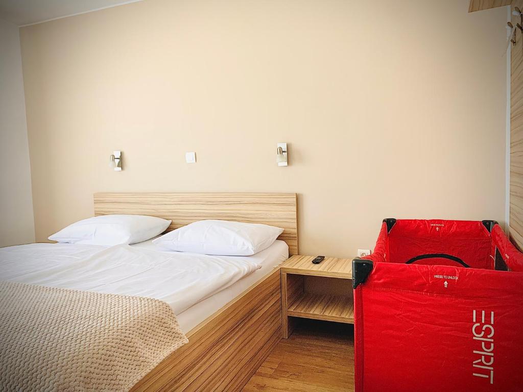 Postel nebo postele na pokoji v ubytování Stara lipa Tašner FREE kitchen&garage&parking-self check in