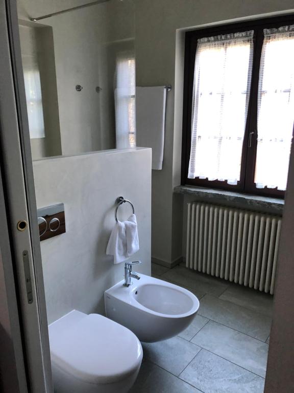 Koupelna v ubytování Alveluu ristorante e suites