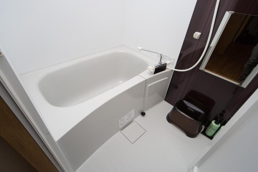 Koupelna v ubytování Ebisu Ryokan