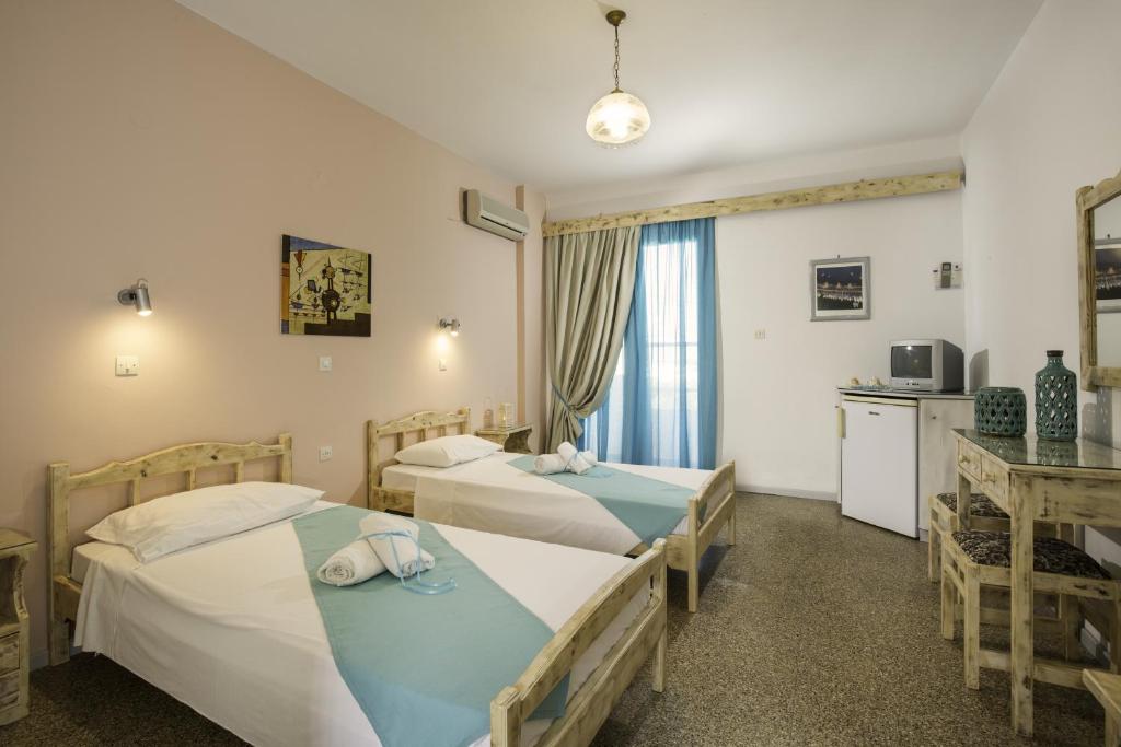 Kalathos Sun Hotelにあるベッド