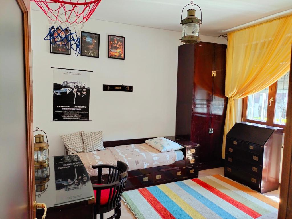 Кровать или кровати в номере Sunnyside Accademia