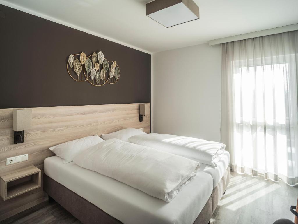 Postel nebo postele na pokoji v ubytování Motel Waidhofen an der Thaya