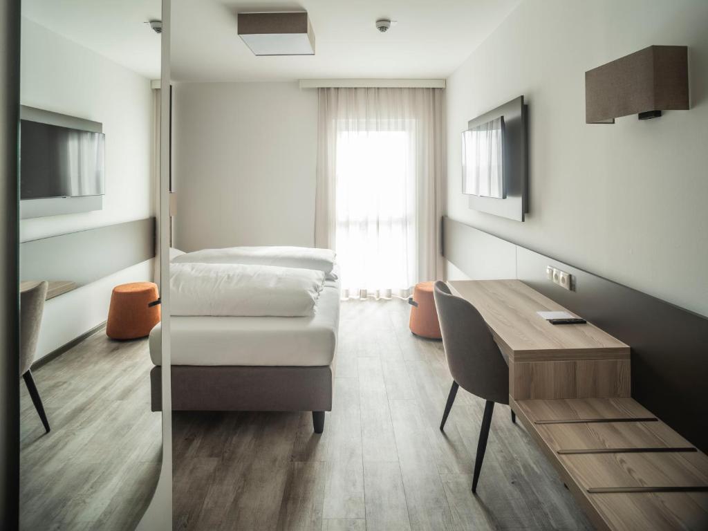 Postel nebo postele na pokoji v ubytování Motel Waidhofen an der Thaya