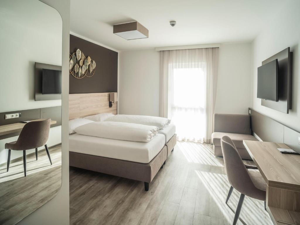 TV a/nebo společenská místnost v ubytování Motel Waidhofen an der Thaya