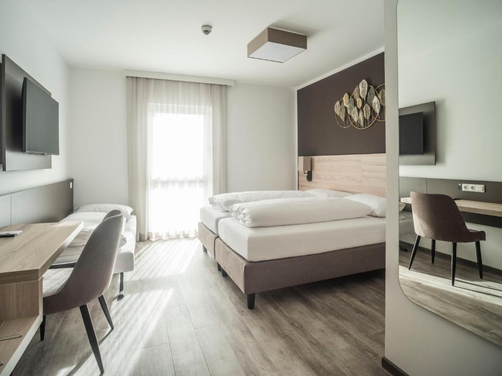 Postel nebo postele na pokoji v ubytování Motel Waidhofen an der Thaya