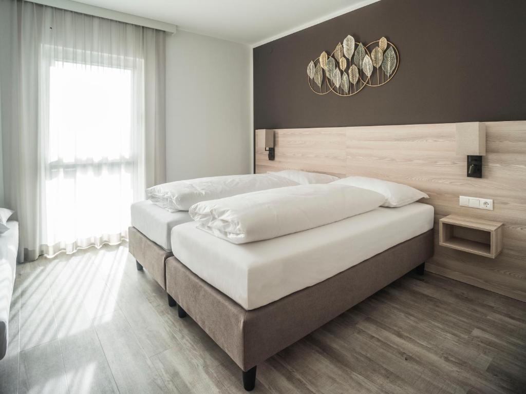 Postel nebo postele na pokoji v ubytování Motel Waidhofen an der Thaya