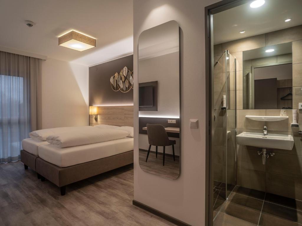 Postel nebo postele na pokoji v ubytování Motel Waidhofen an der Thaya