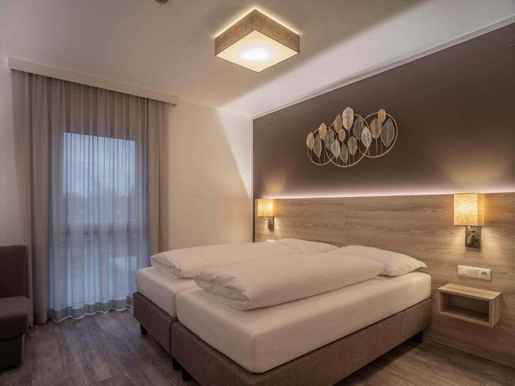 Postel nebo postele na pokoji v ubytování Motel Waidhofen an der Thaya