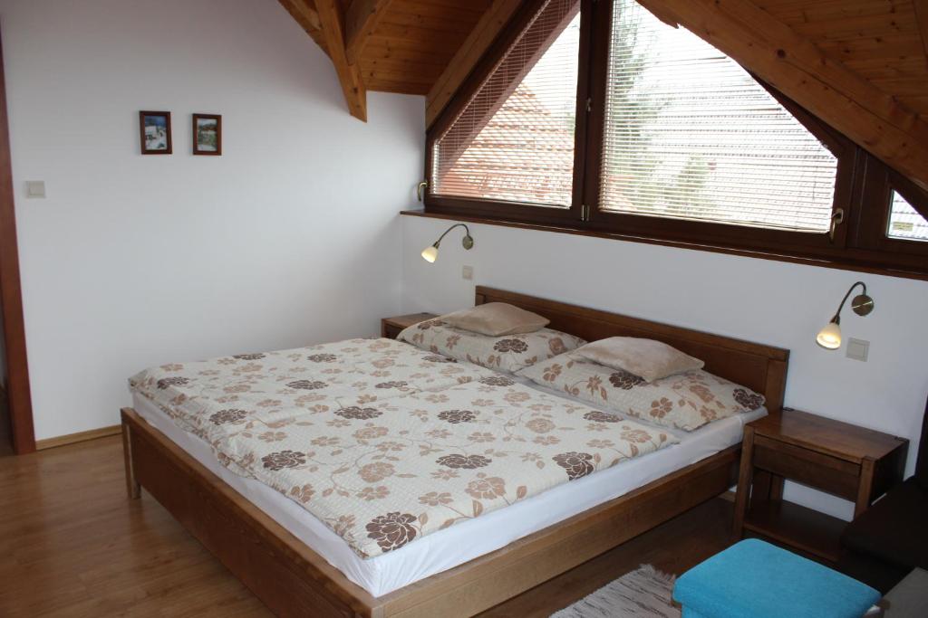 Postel nebo postele na pokoji v ubytování Penzion Úsmev