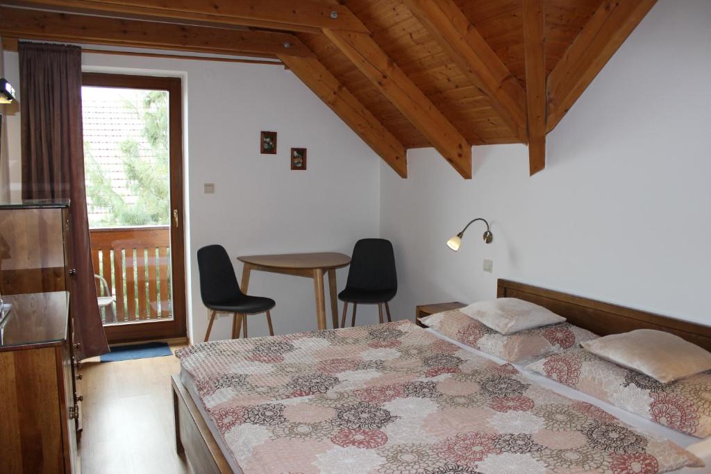 Postel nebo postele na pokoji v ubytování Penzion Úsmev