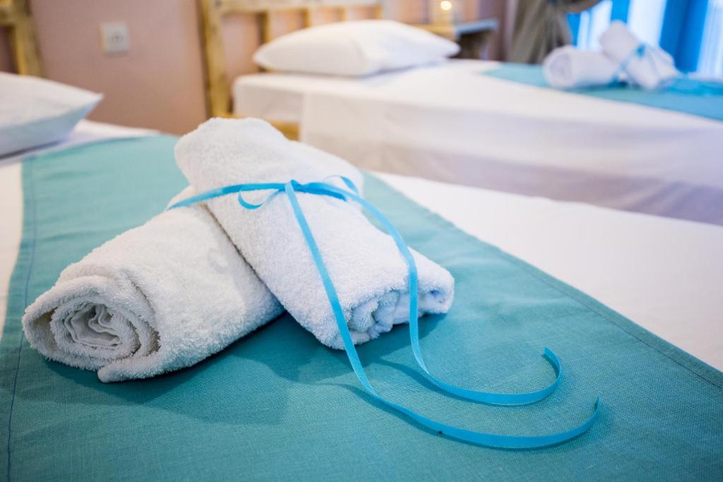 Kalathos Sun Hotelにあるベッド
