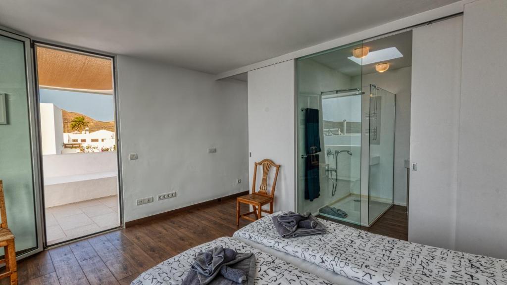 Postel nebo postele na pokoji v ubytování Villa Amor