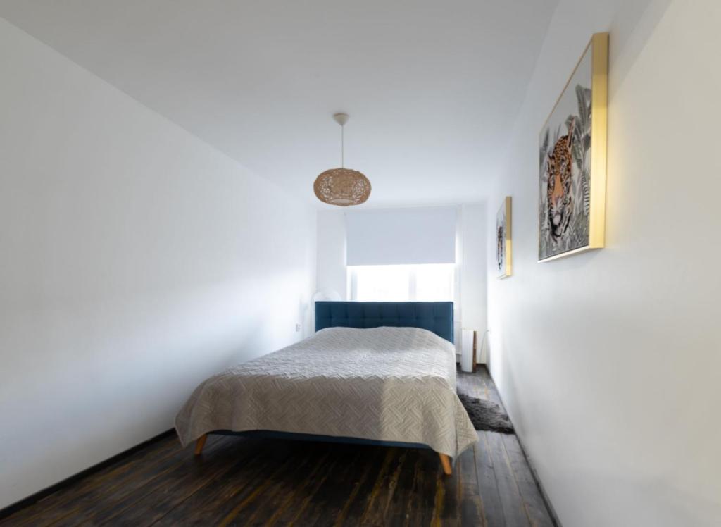 Postel nebo postele na pokoji v ubytování Apartments24 Laada 4