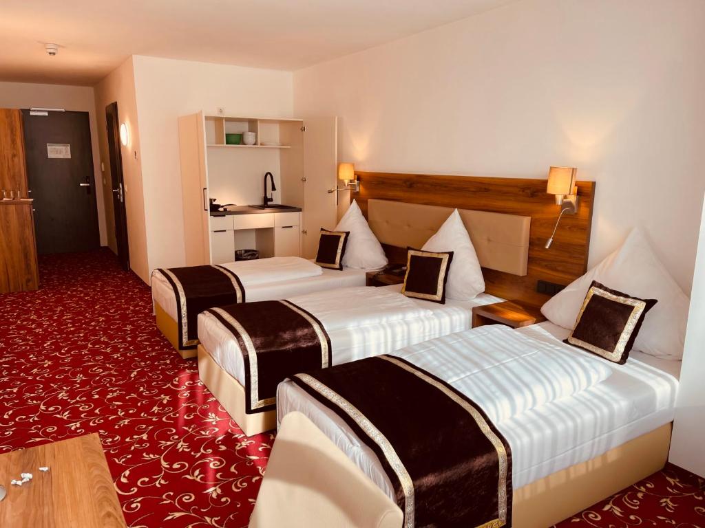 Postel nebo postele na pokoji v ubytování Hotel Luna