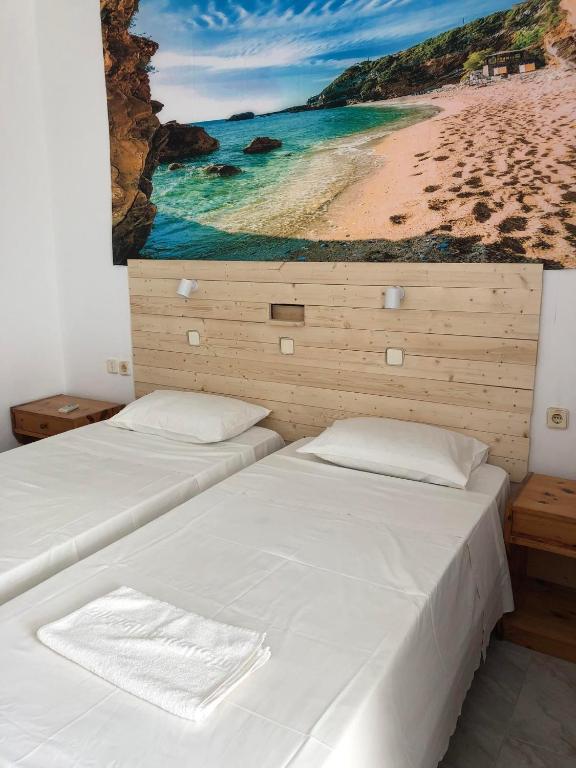 Postel nebo postele na pokoji v ubytování Antonis Hotel