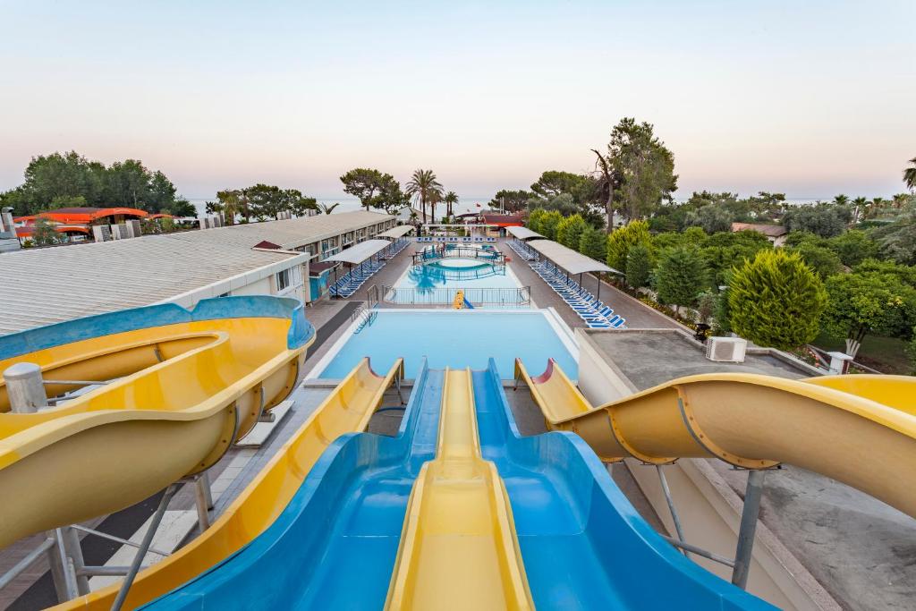 a pool at a water park with slides at Club Hotel Belpınar-Beldibi-Kemer in Beldibi