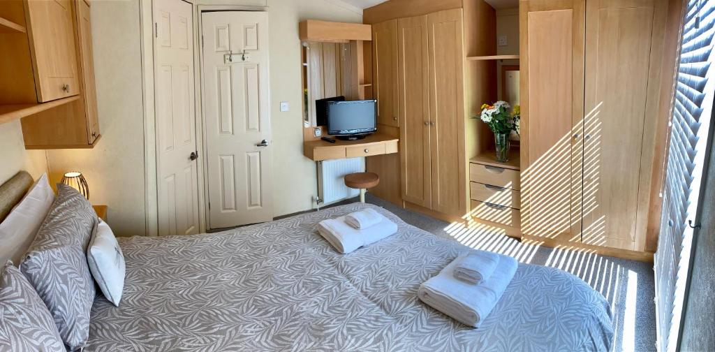 TV o dispositivi per l'intrattenimento presso Earls View Caravan