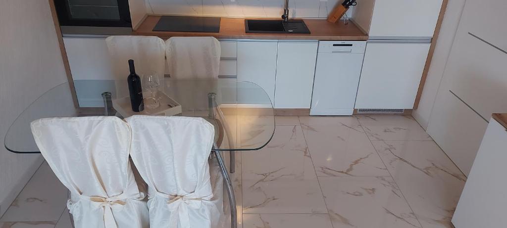 Kuchyň nebo kuchyňský kout v ubytování Apartman Lane