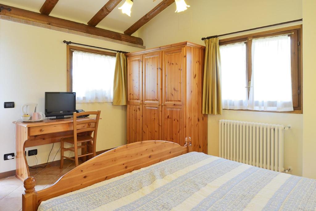 TV a/nebo společenská místnost v ubytování Bed And Breakfast Montino