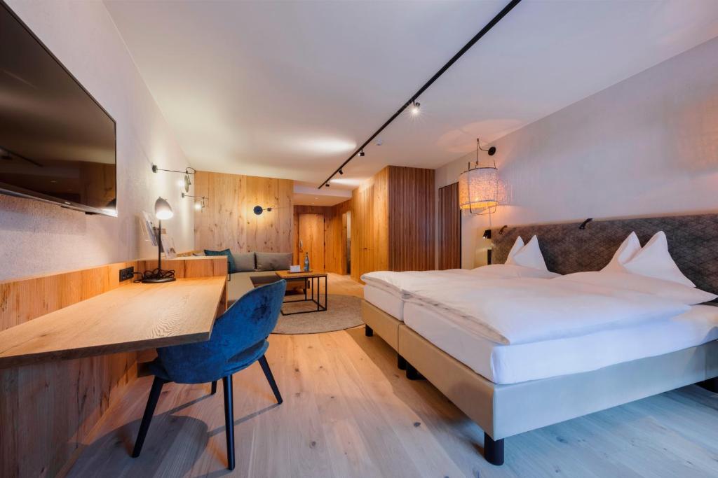 Posteľ alebo postele v izbe v ubytovaní Hotel Schwarzer Adler - Sport & Spa