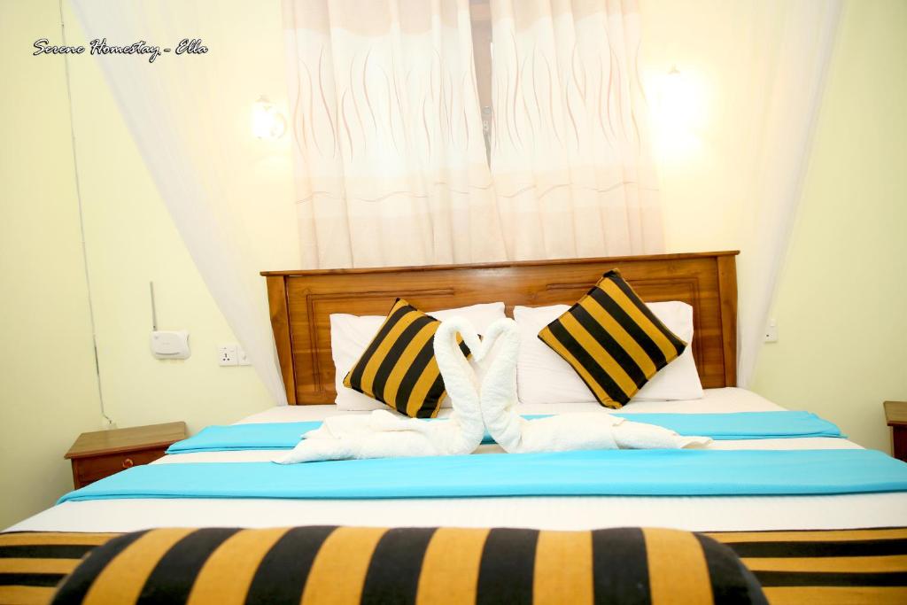 Postel nebo postele na pokoji v ubytování Serene Homestay Ella