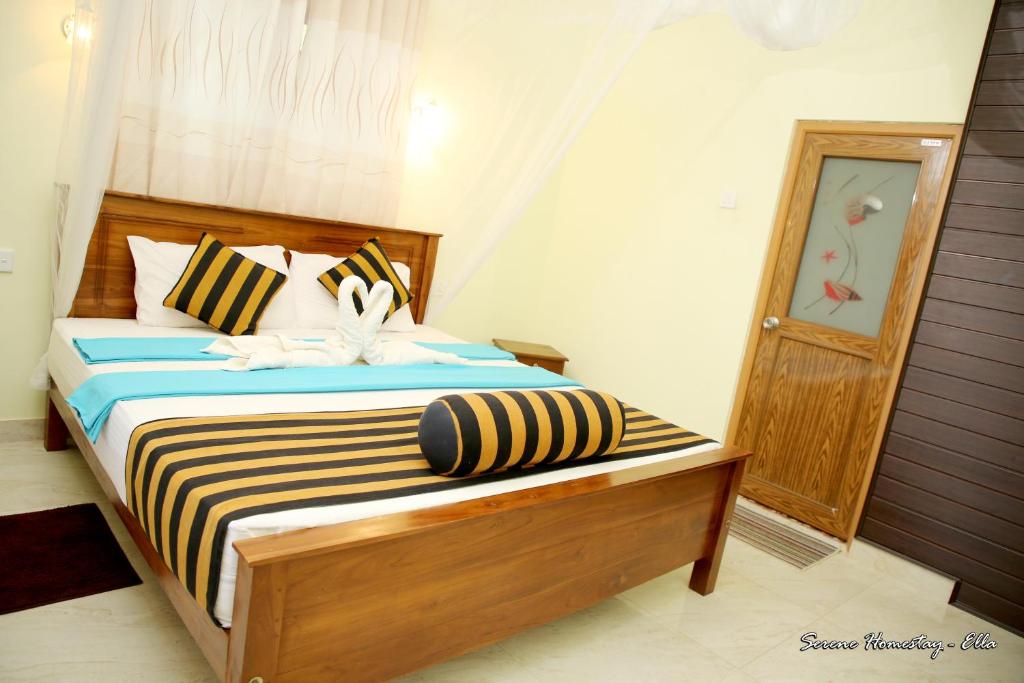 Postel nebo postele na pokoji v ubytování Serene Homestay Ella