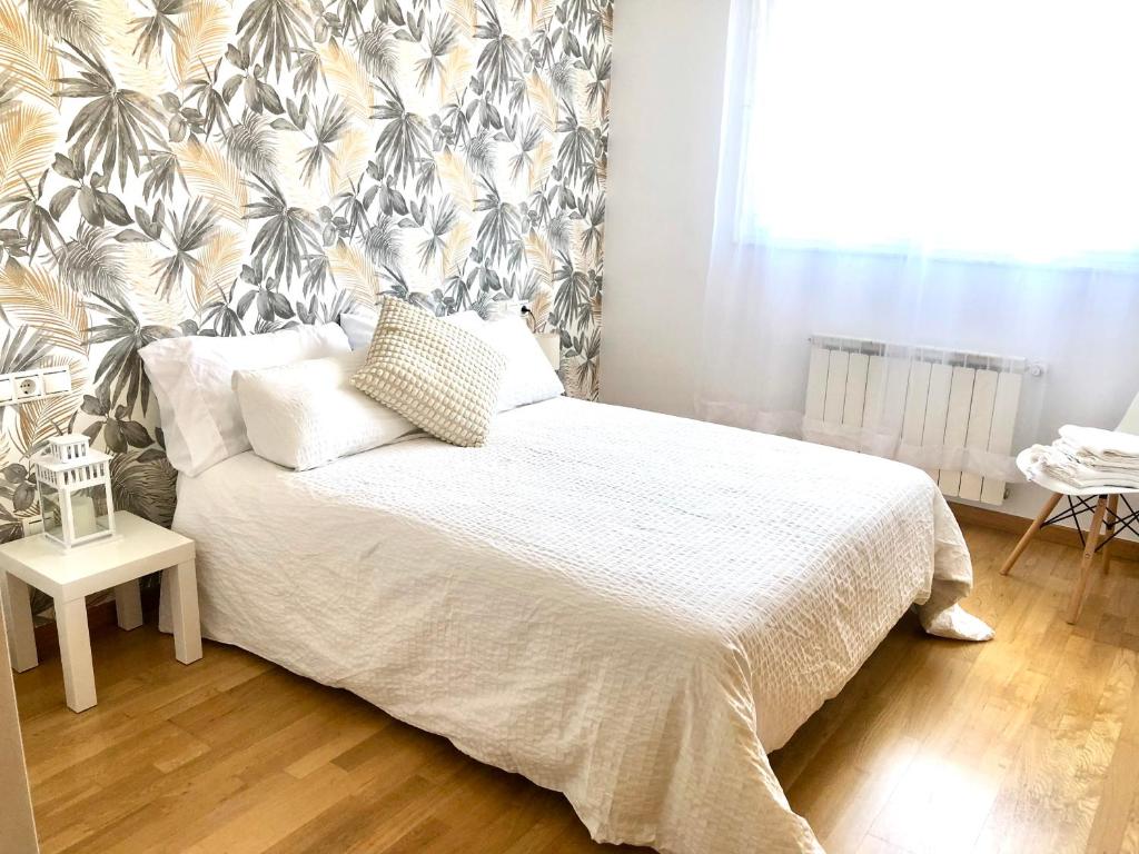 Piso bonito Negreiraにあるベッド