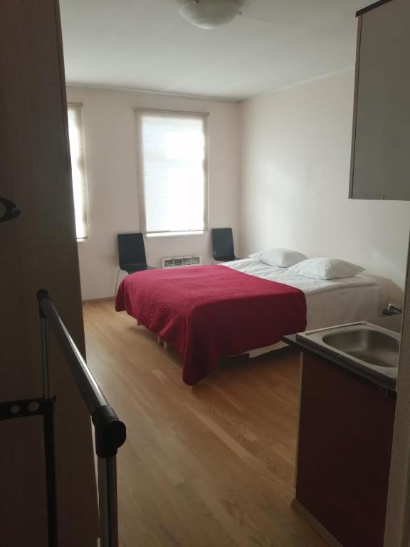 Postel nebo postele na pokoji v ubytování Telliskivi Apartment