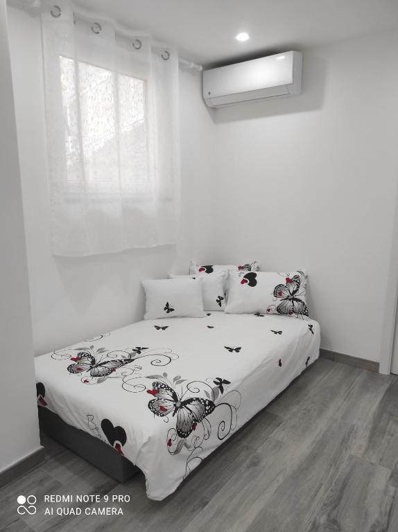 A bed or beds in a room at Casa Mario