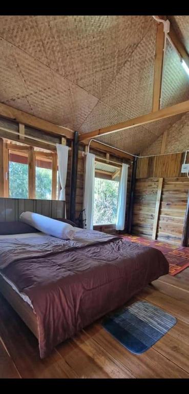 Postel nebo postele na pokoji v ubytování PeaMoo Homestay