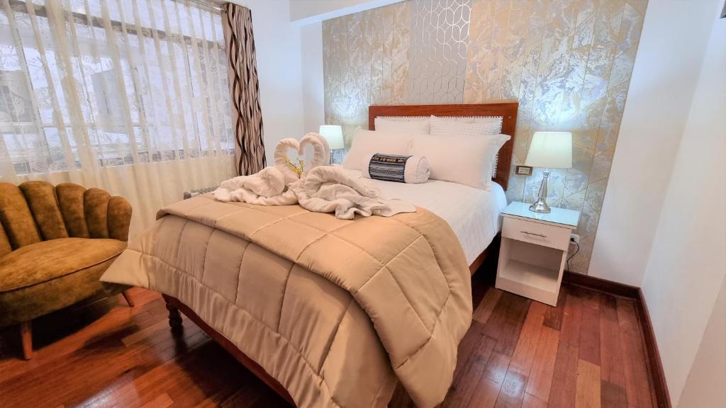 Postel nebo postele na pokoji v ubytování Hotel-Apartment INKASABIOS