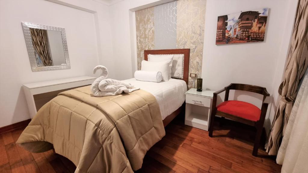 Postel nebo postele na pokoji v ubytování Hotel-Apartment INKASABIOS