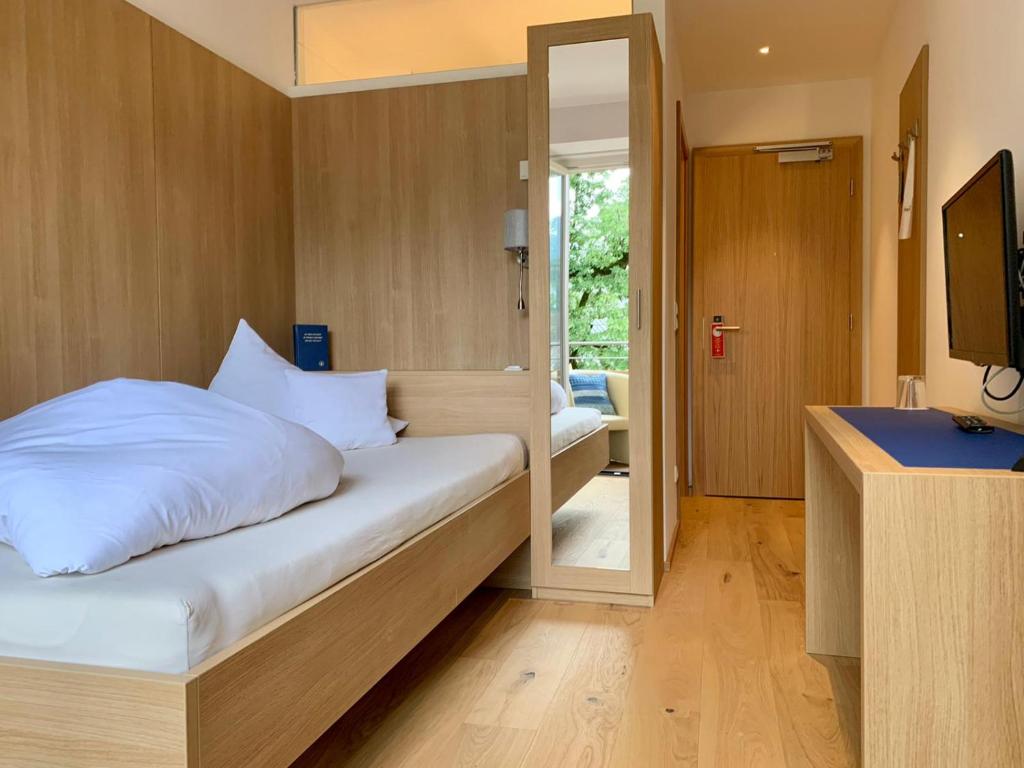 Postel nebo postele na pokoji v ubytování Hotel Kendler