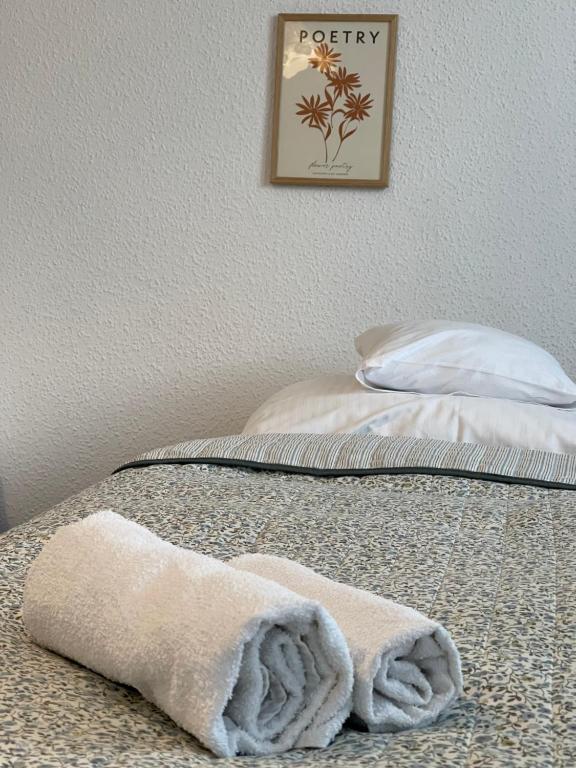Posteľ alebo postele v izbe v ubytovaní Apartamenty Cud Miód