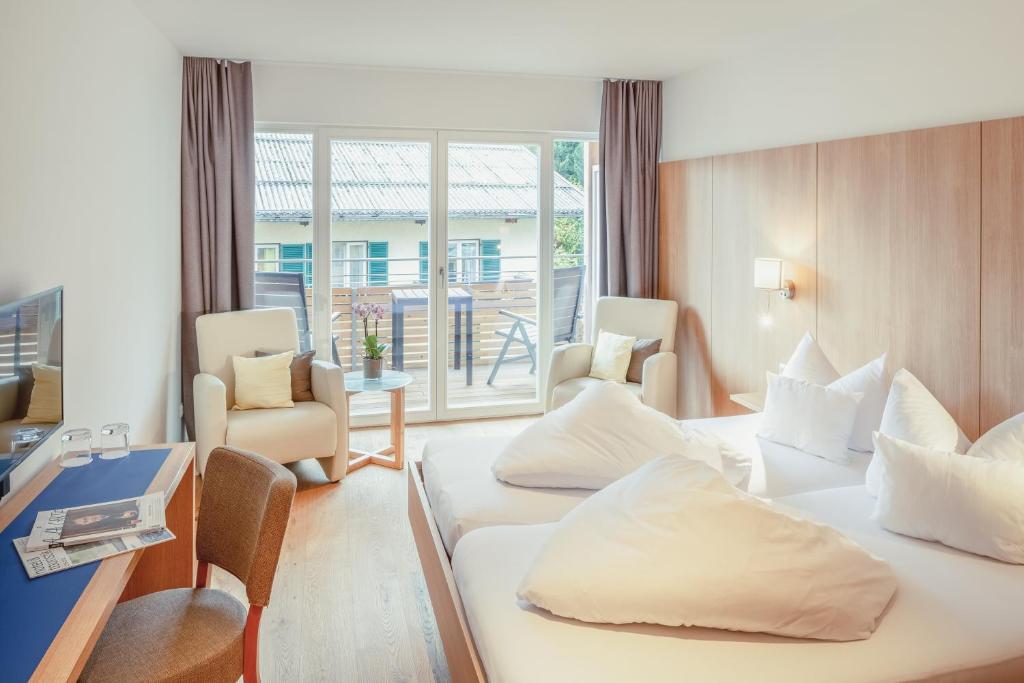 Postel nebo postele na pokoji v ubytování Hotel Kendler