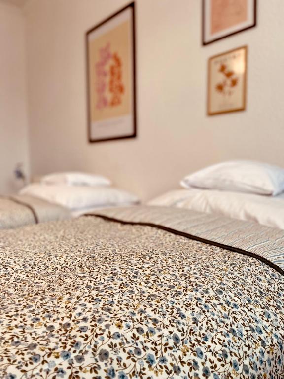Posteľ alebo postele v izbe v ubytovaní Apartamenty Cud Miód