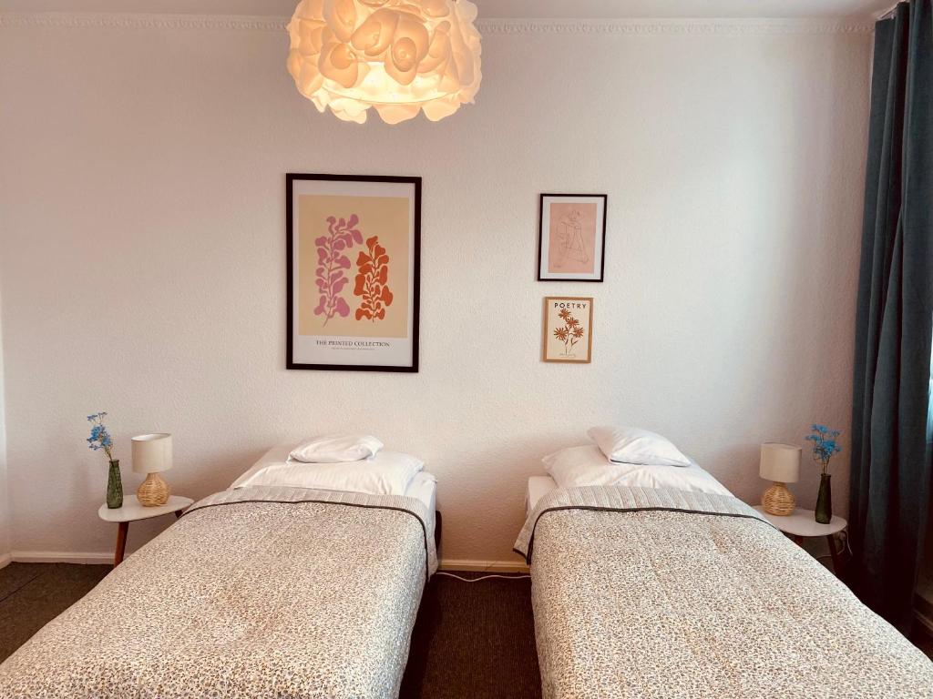 Posteľ alebo postele v izbe v ubytovaní Apartamenty Cud Miód