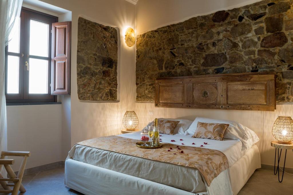Posteľ alebo postele v izbe v ubytovaní Moon's Tower suite&rooms