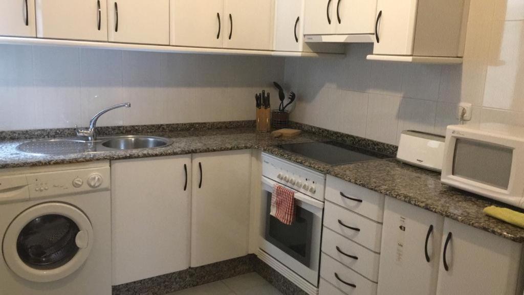 Kuchyňa alebo kuchynka v ubytovaní APARTAMENTO A PIE DE PLAYA