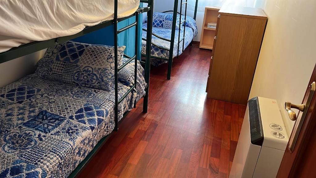 Posteľ alebo postele v izbe v ubytovaní APARTAMENTO A PIE DE PLAYA